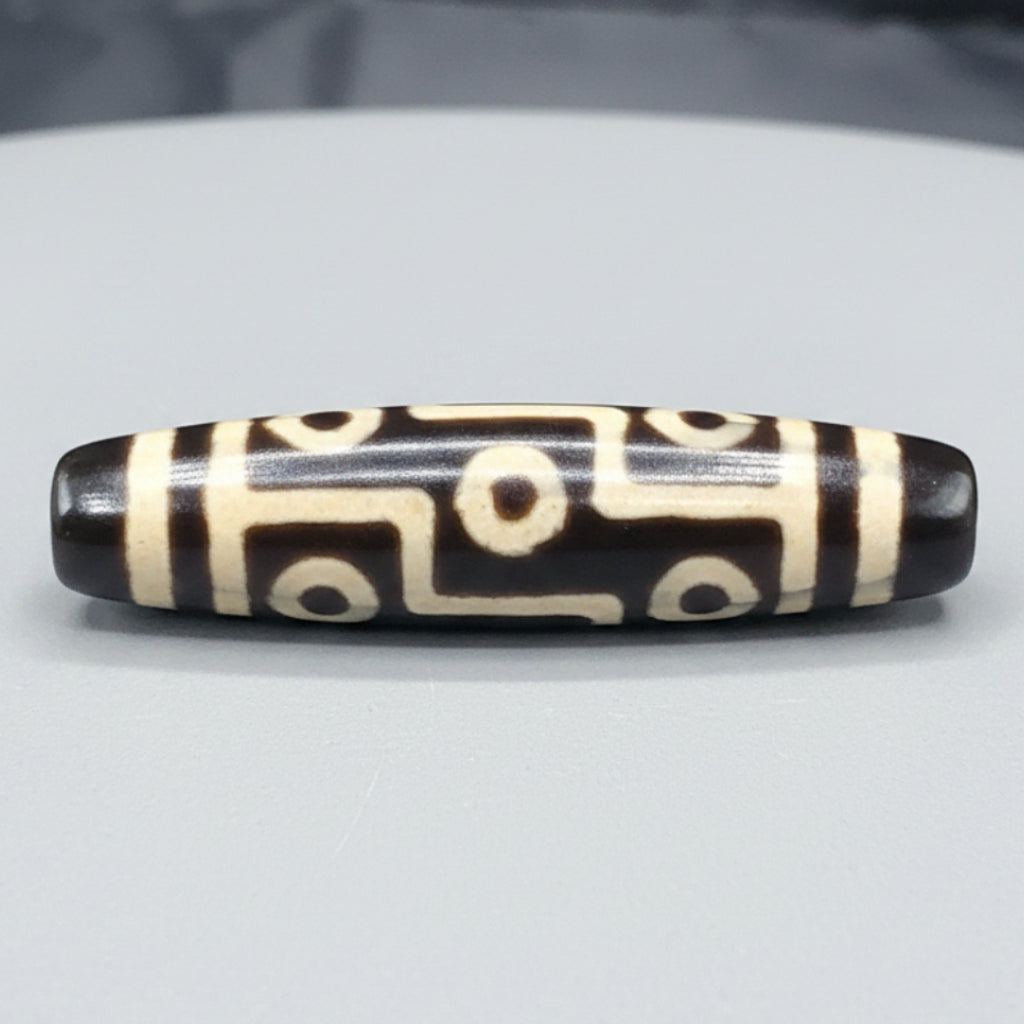 Amulette tibétaine de perle Dzi en agate à 9 yeux de l'Himalaya