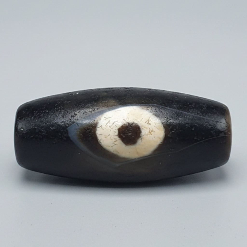 Amulette tibétaine vintage perle d'agate œil de Dzi de l'Himalaya