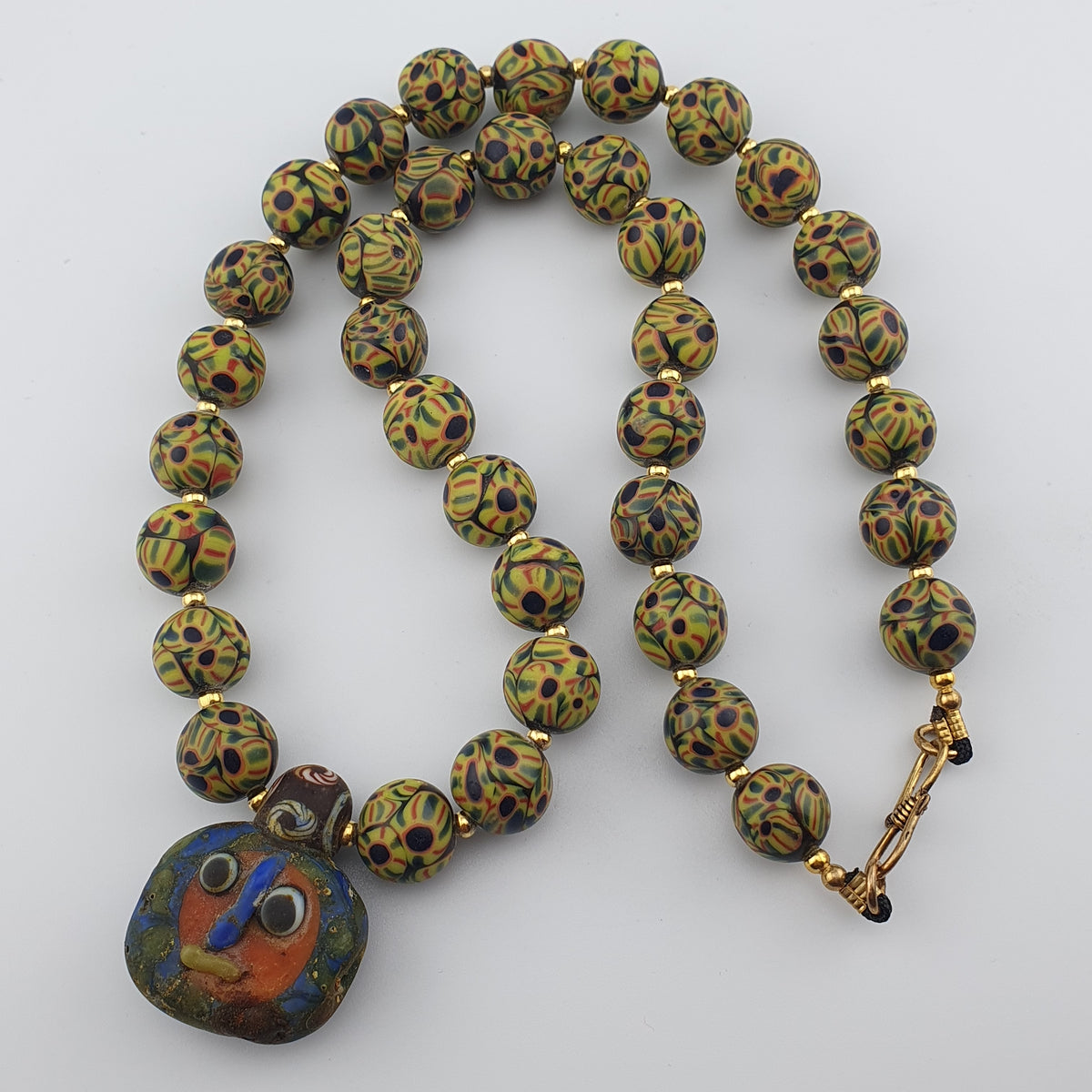 Perles de verre œil de style vénitien vintage et perles de verre visage ancien