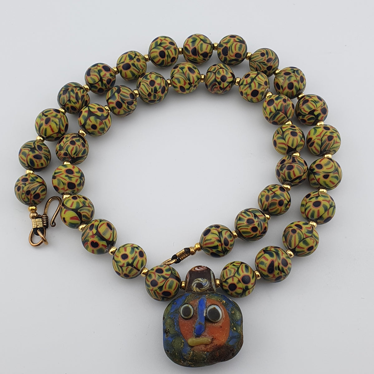 Perles de verre œil de style vénitien vintage et perles de verre visage ancien