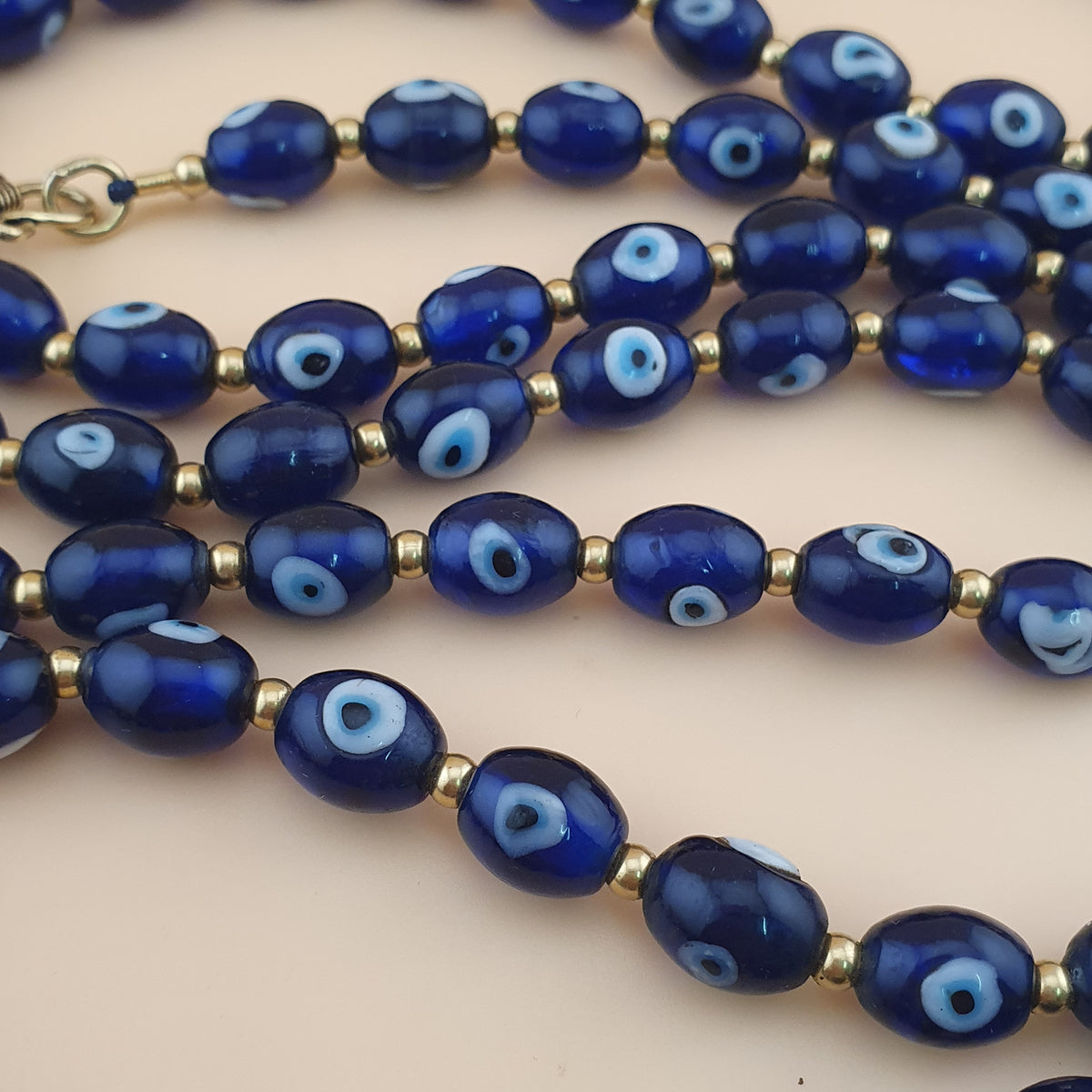 Collier de perles en verre œil de Hamsa de style vénitien antique