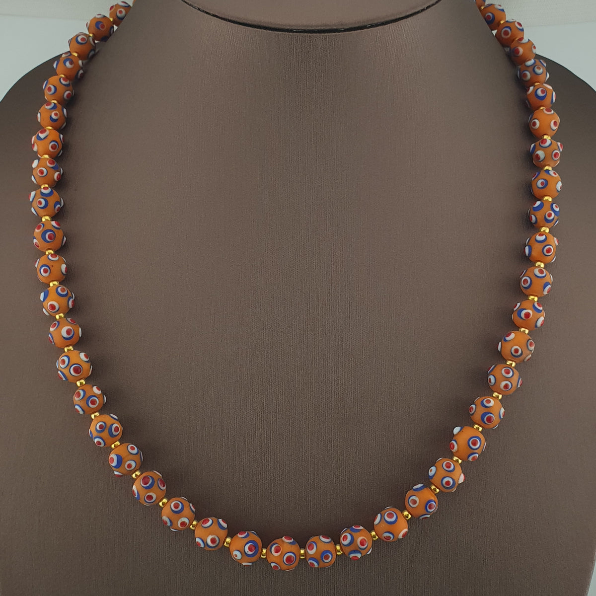 Collier de perles en verre orange style vénitien ancien, yeux de mouffette