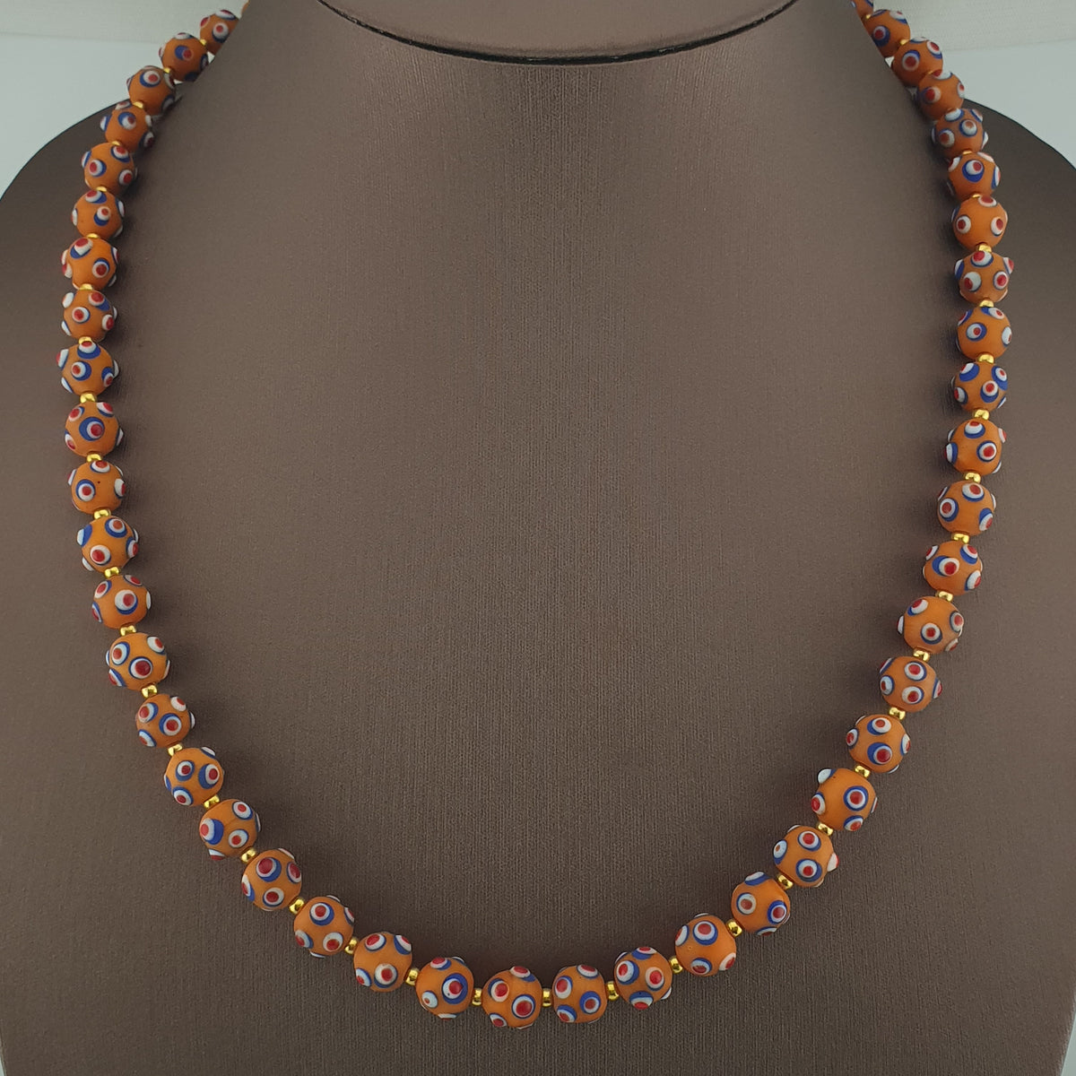 Collier de perles en verre orange style vénitien ancien, yeux de mouffette