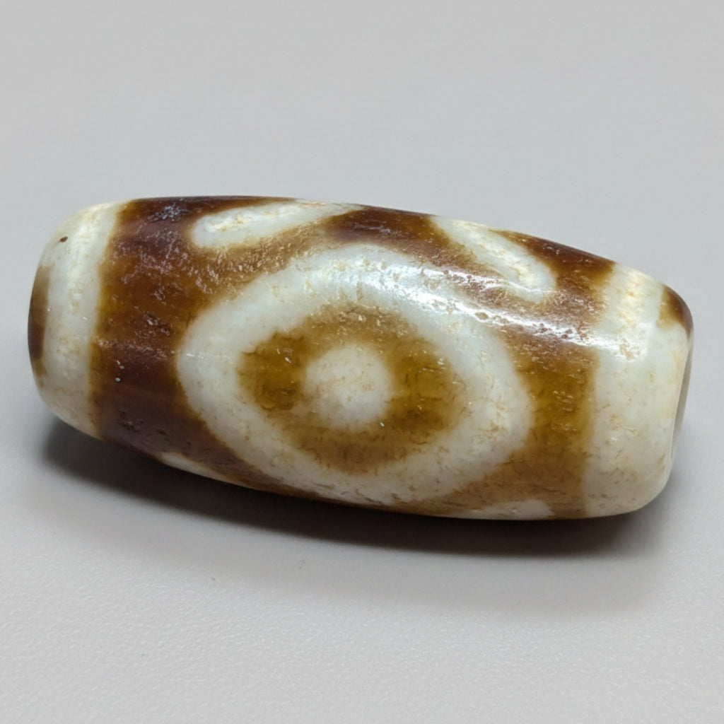 Amulette tibétaine vintage perle Dzi en agate des 2 yeux de l'Himalaya
